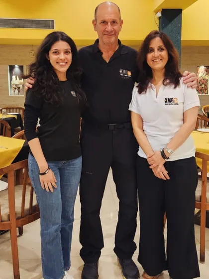 Our instructors Dipika and Rachel Vaz with the source of Krav Maga, Master Eyal Yanilov. This direct lineage is what makes our training authentic.