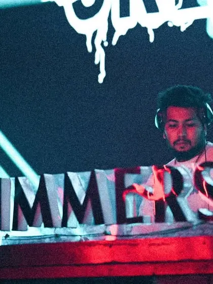 A quiet moment of focus at the decks at Shimmers. It's all about concentration and feeling the music.