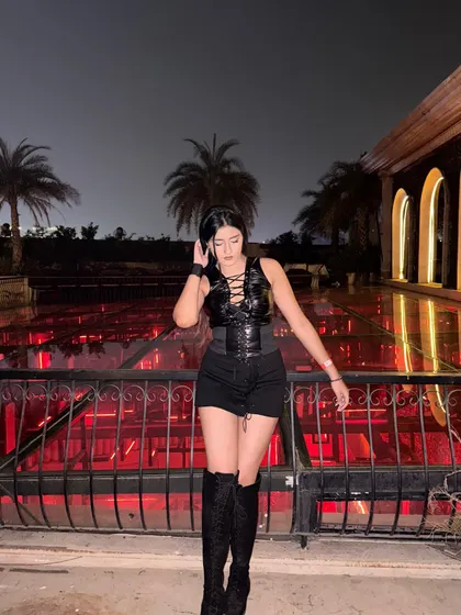 A full-length shot of the spooky season outfit.