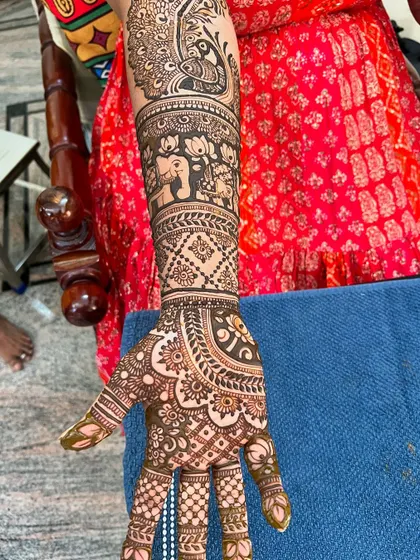 Another shot of the same arm, highlighting the fine details and clean lines of the artwork.