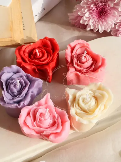 Another view of the heart-shaped rose candles. They are a perfect small gift or party favor for a wedding or bridal shower.