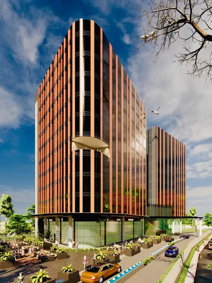 An architectural rendering of a Grade A business building on the Noida-Greater Noida expressway. The design is rooted in solar passive principles, with vertical fins that control heat gain while creating a dynamic, rhythmic pattern across the facade, integrating green spaces at the ground level.