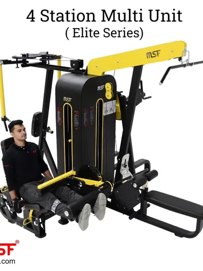 A user on the leg extension station of the 4-Station Multi-Unit.