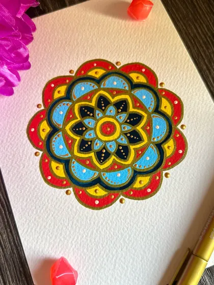 All I need is art therapy. A simple, colorful flower-like mandala using primary colors. It’s a playful piece that was so much fun to create.