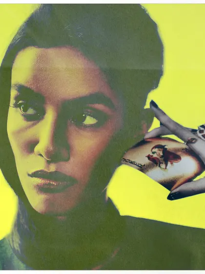 A high-contrast portrait with a yellow color overlay, focusing on the model's gaze. A collaged hand holding a perfume bottle adds another layer of commentary on beauty and advertising imagery.