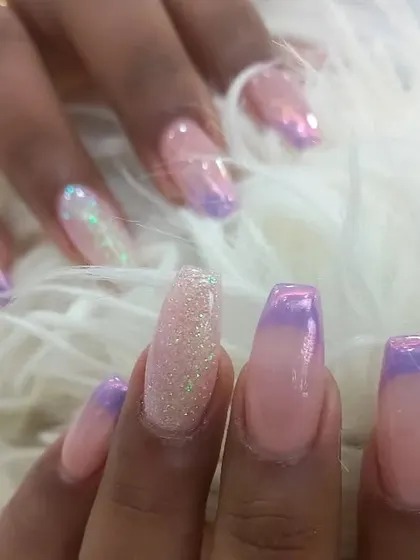 A soft lavender and pink ombré with a glitter accent nail.