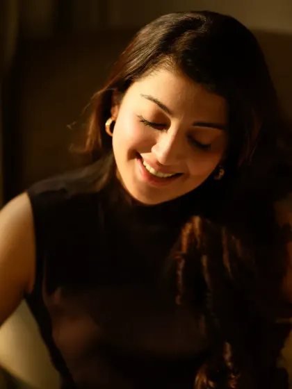 A candid and joyful moment with Pranitha, captured as the sun creates a beautiful flare. These unposed shots are often the most memorable.