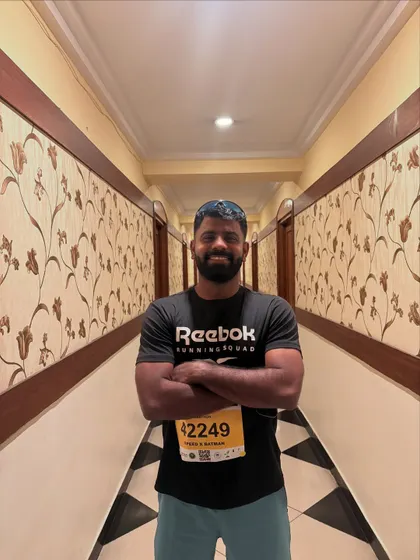 All set and focused before the Hyderabad Full Marathon. A quiet moment of preparation before the storm.