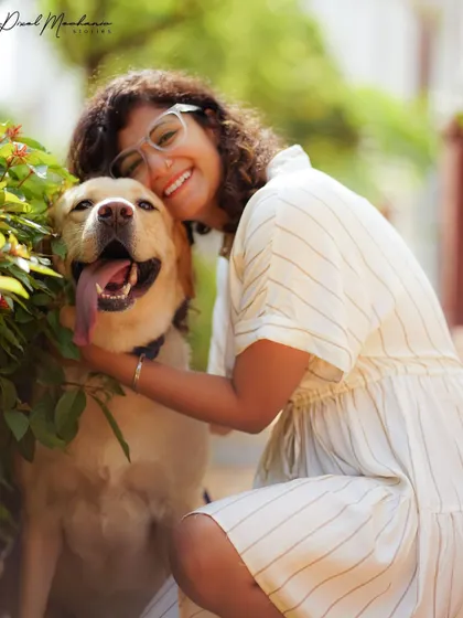 The pure happiness in this shot is contagious. A girl and her dog, sharing a moment of affection, makes for the most heartwarming and authentic kind of portrait.