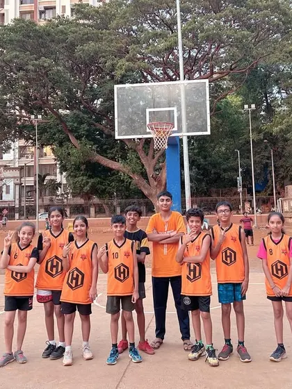 A group photo of our U-11 runners-up, Team Alpha, at Hooplah '24. These kids are the future of the sport.