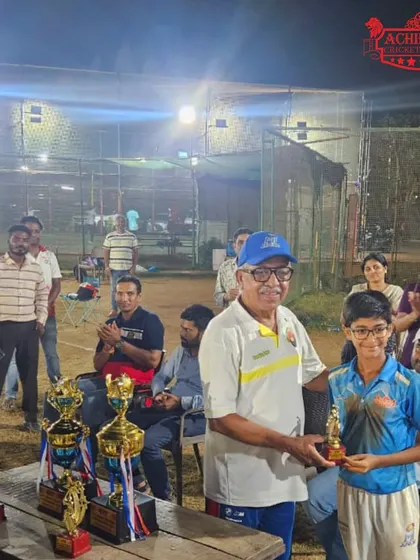 An award ceremony moment from the U-11 night tournament, recognizing the hard work of our young players.