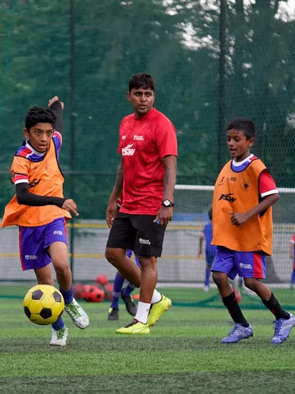 Former BFC star Rino Anto oversees a training session. Having coaches who have played at the highest level gives our young players a unique advantage and direct insight into professional football.