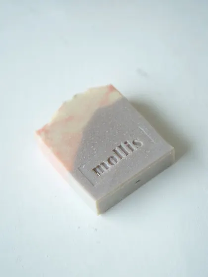 My Lavender Patchouli soap, naturally tinted with alkanet root infusion. It carries calming notes of lavender blended with the grounding richness of patchouli.