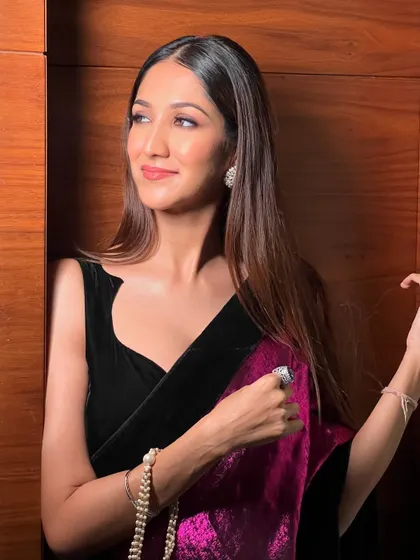 The dewy skin is the star of this look. I use specific techniques and products to create a long-lasting, luminous glow that looks amazing on camera.