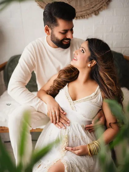 A playful and happy moment in our boho setup. The all-white outfits and the natural textures create a light and airy feel.