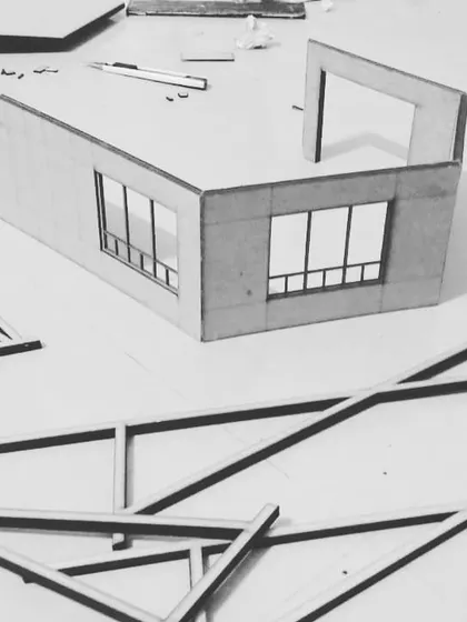 Another view of a work-in-progress architectural model. Building physical models allows me and my clients to visualize and refine details like window placements and wall openings before construction begins.