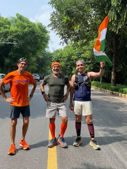 Three members of our 60k club, celebrating their massive achievement with the Indian flag. This run was part of their preparation for the Khardung La ultramarathon.