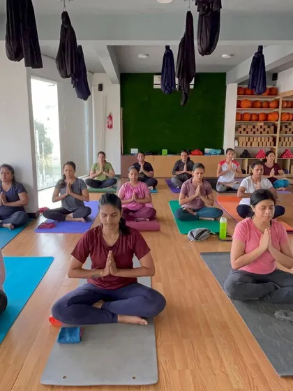 A class of women finding their center together. We offer a supportive space for women to focus on their health and wellbeing.