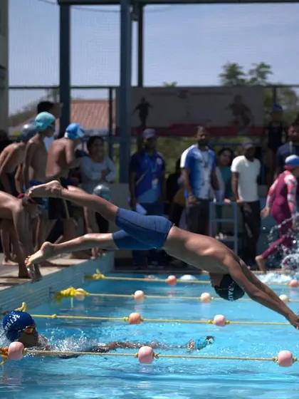Capturing the peak of the dive, this photo shows the technique and training of our young athletes.