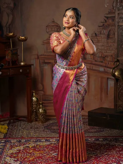 A candid shot that captures the elegance of the drape and the richness of the silk fabric. It's all about creating a look that feels as good as it looks.