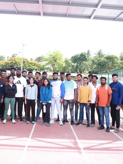 The team stands on the newly laid synthetic track at Kitturu Rani Chennamma Stadium, ready for a new chapter of success.