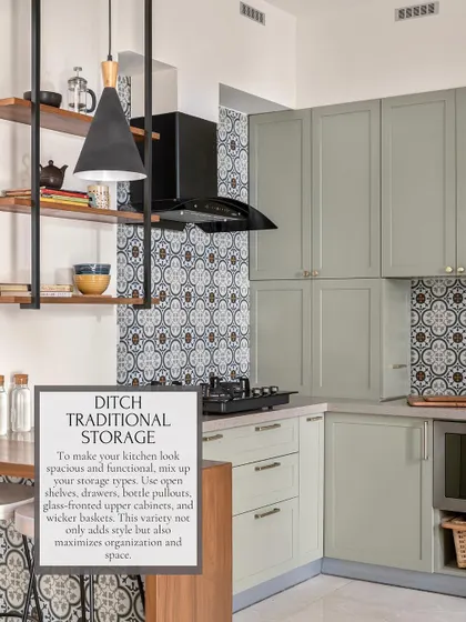 To make a kitchen feel spacious and functional, I mix different storage types. This kitchen combines open shelves, drawers, and closed upper cabinets to maximize organization and add visual interest.