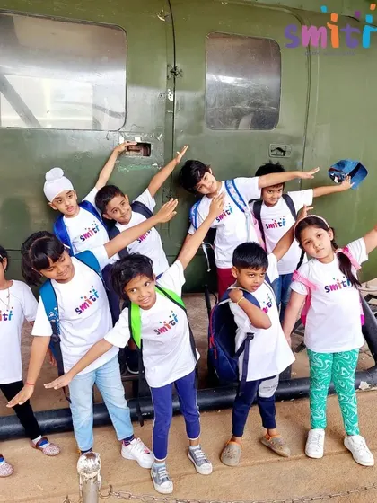 Our little explorers strike a pose in front of a helicopter during their field trip to the Aerospace Museum. We believe learning extends far beyond classroom walls, with real-world excursions that spark curiosity and excitement.