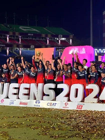 Another angle of the full team celebrating our WPL 2024 victory on the podium. A memory etched in RCB history forever.