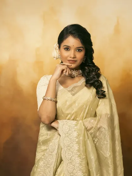 A collection of images from a retro-themed photoshoot with the beautiful actress Sanjana Tiwari. I created a soft, classic hairstyle with side-swept curls and floral accents to match the vintage aesthetic.