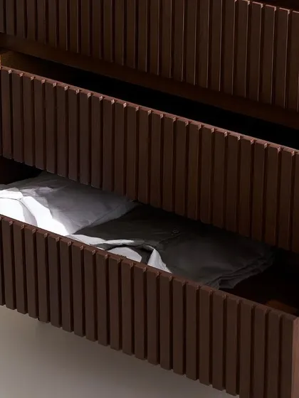 A detail shot showing the open drawers of the slatted chest. This highlights the craftsmanship, interior finish, and storage capacity, which are key selling points for furniture.
