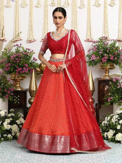 The full ensemble, with the dupatta elegantly draped, creates a look of regal splendor.