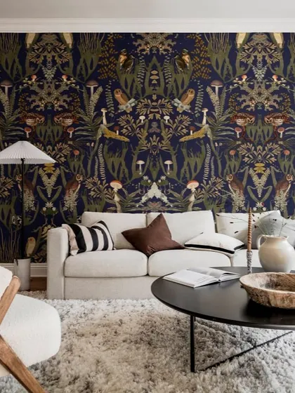 A concept for a moody and intricate wallpaper with a dark background and dense forest pattern. This style is great for creating a cozy and sophisticated "maximalist" look.