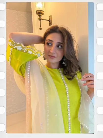 A close-up on the details of the lime green kurta and sheer dupatta. It’s these little elements that bring a whole look together.