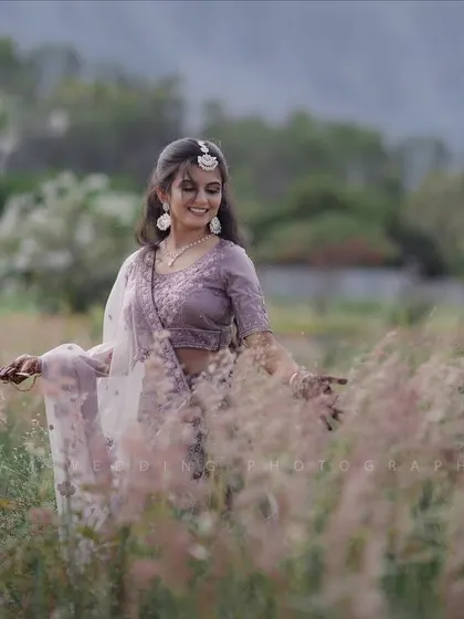This ethereal shot showcases a soft and natural makeup look, perfect for a romantic, nature-inspired engagement session.