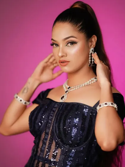 A confident and chic look, perfect for any party or evening event.