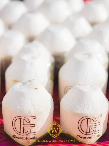 Even the refreshments were on-theme. We arranged for custom monograms to be printed on coconuts, offering a refreshing and personalized treat for guests at this fun-filled Mehendi.