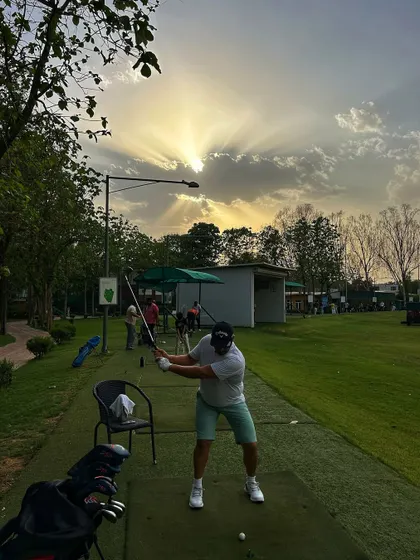 A spectacular sunset with sun rays breaking through the clouds, creating a stunning backdrop for an evening session.