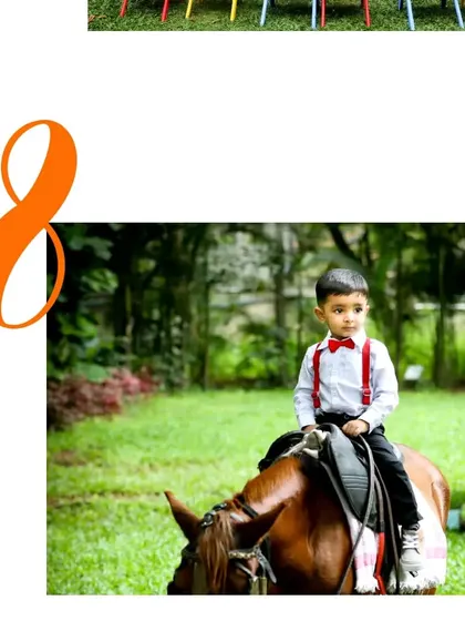 The birthday boy making a showstopper entrance on a pony, a truly memorable moment for a first birthday.