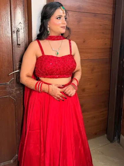 Another beautiful pose, her makeup looking flawless and her outfit vibrant.