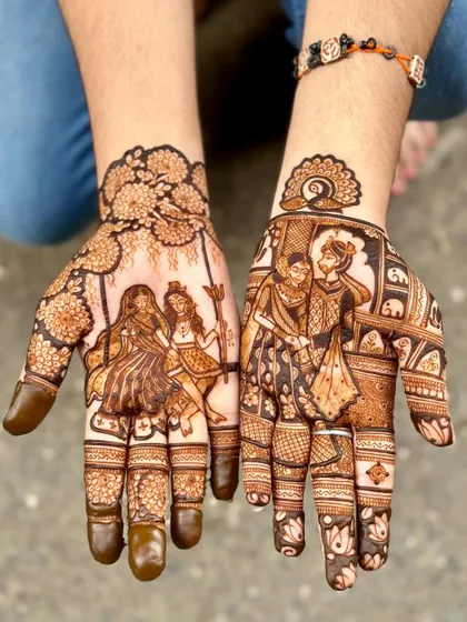 A beautiful Teej design with a couple on a swing under a tree.