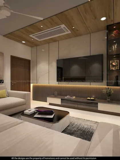 This living room combines a comfortable sectional sofa with a TV unit set against a marble and wood-paneled wall. The design includes a vertical glass-fronted display cabinet.