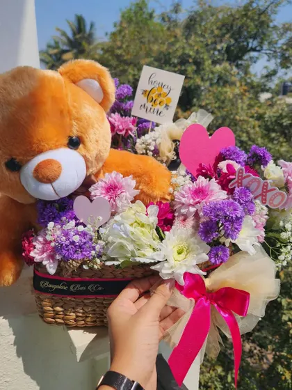 A duplicate image of the flower basket with a teddy bear, another great option for Teddy Day.