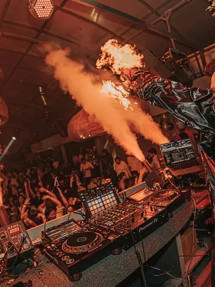 Getting up close with the crowd while the pyro effects go off. This is what creating an immersive, high-energy clubbing experience is all about.