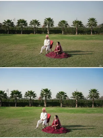 A minimalist yet grand portrait of the couple in a vast green lawn, with a line of palm trees in the background. This shot emphasizes their togetherness.
