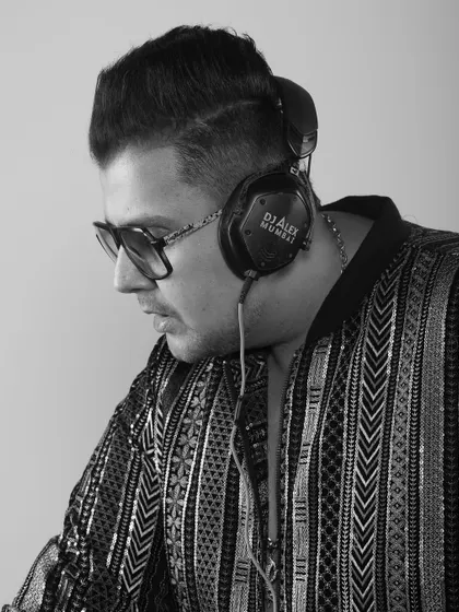 Another black and white profile, highlighting the focus and concentration it takes to deliver a perfect set.