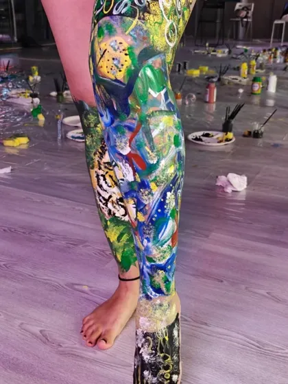 A full-leg canvas of abstract expression. In my workshops, there are no rules. It's about the process of painting and connecting, not about creating a perfect picture.