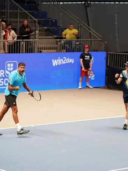 Celebrating a point won with my partner. Teamwork makes the dream work.