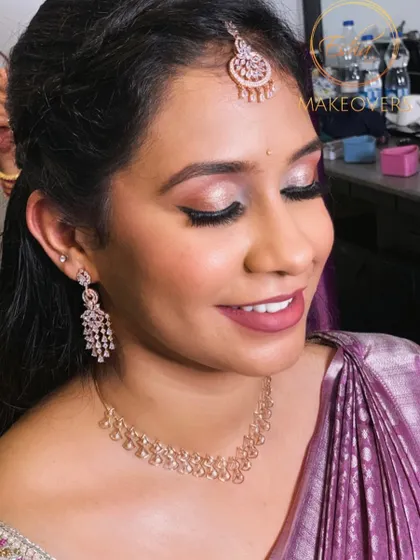 A lovely look for a wedding guest in a lilac saree. I used shimmery pink and silver eyeshadow to match the cool tones of her outfit, paired with a matte mauve lipstick.