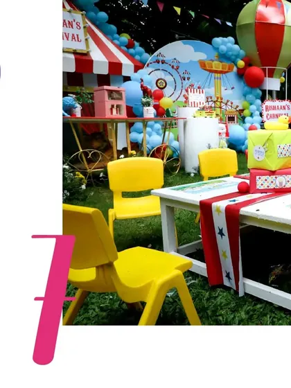 A dedicated and colorfully decorated seating area for the youngest guests at the carnival.