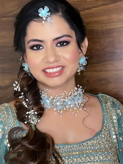 Another look at the popular light blue floral set, paired here with a different outfit to show its versatility for pre-wedding parties.